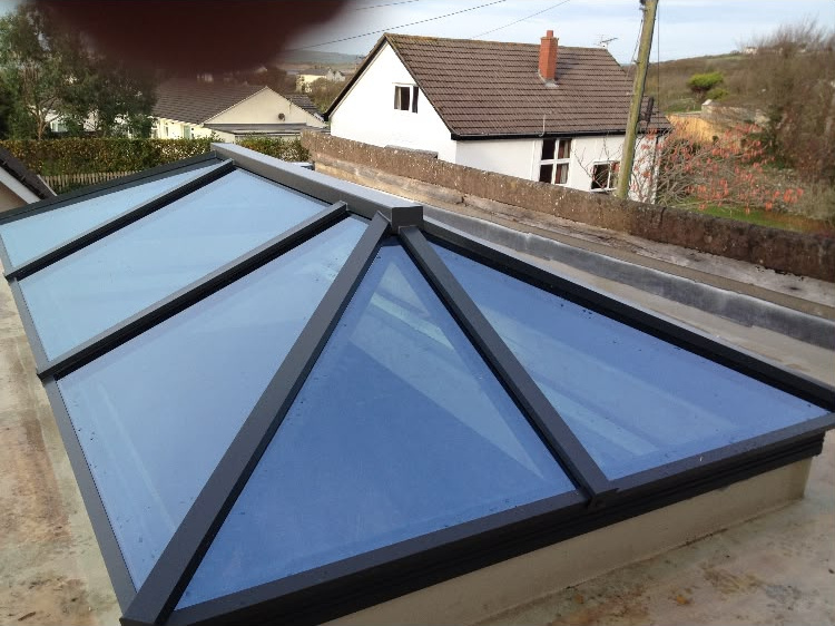 Anthracite grey aluminium roof lantern fitted to a flat roof extension